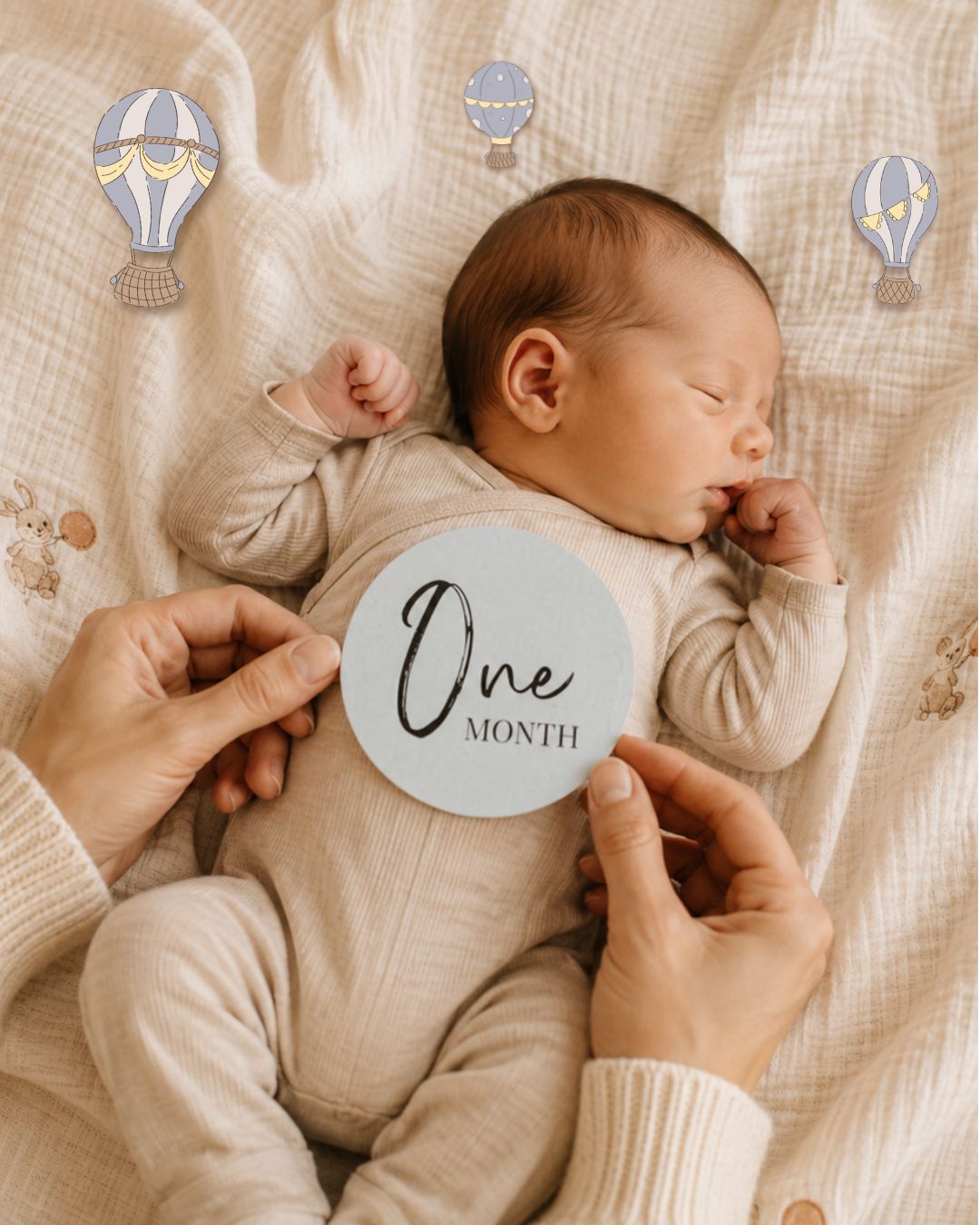 Newborn baby with Tiny Trees one month milestone disc